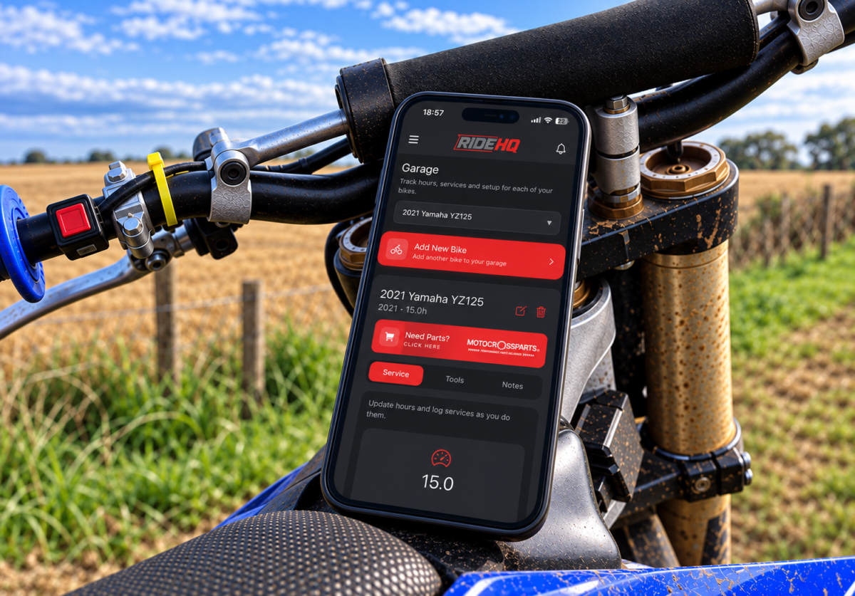 RideHQ bike maintenance app displayed on a motocross bike