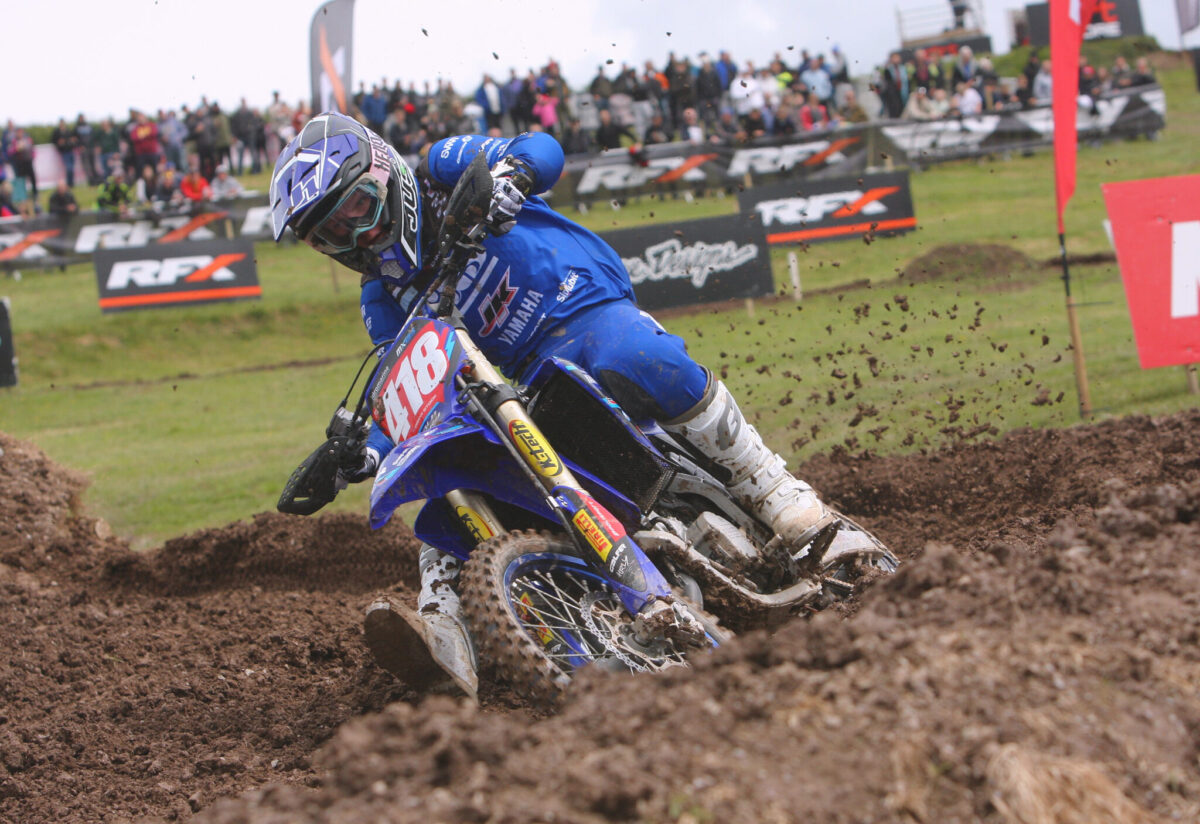 Drew Stock celebrates winning the 2026 British 125cc Motocross Championship at Duns